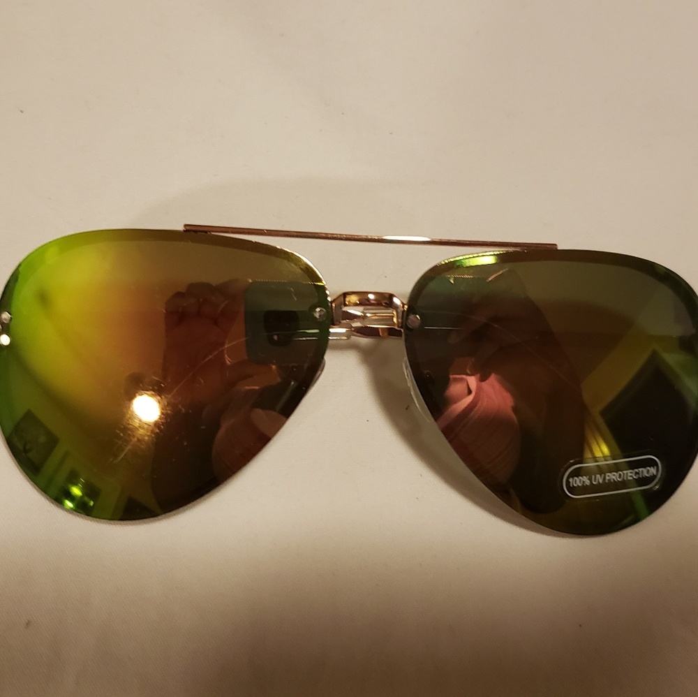 Gold frame sunglasses